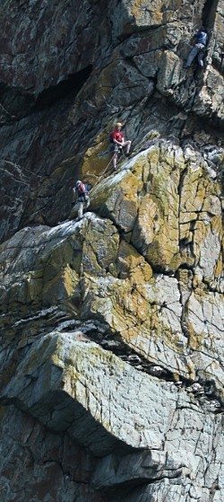 Climbers high up near North Stack