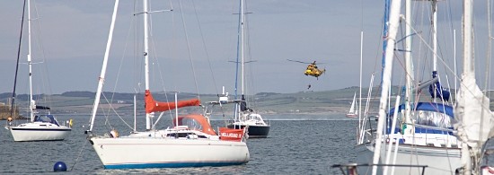 Rescue helicopter practice in the harbour at Holyhead